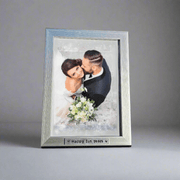 Tin Anniversary gift photo frame displaying a wedding photo with the inscription 'Happy Tin Years'.