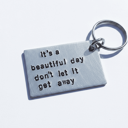 U2 It's A Beautiful Day Don't Let It Get Away Keychain Lyrics Song