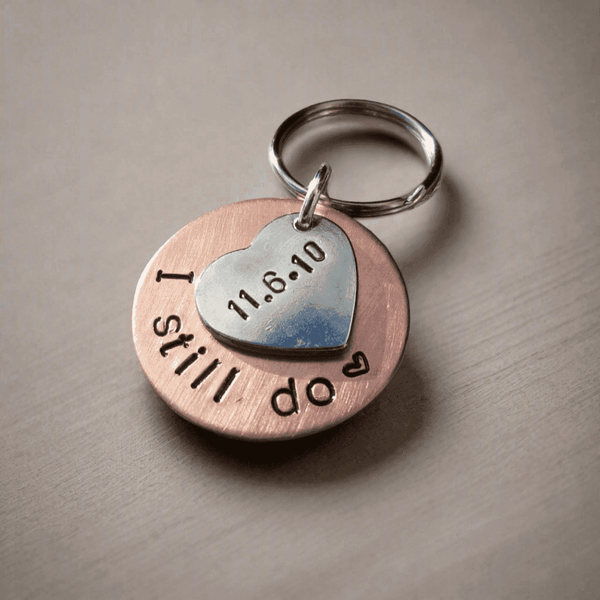 Personalised Bronze Anniversary Gift keychain with hand stamped date and initials, ideal for celebrating love.